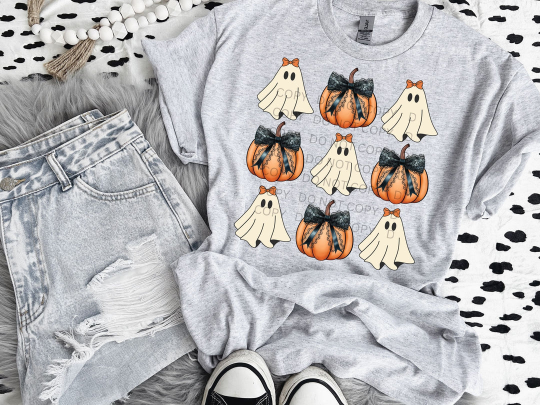 a t - shirt that has a bunch of pumpkins on it