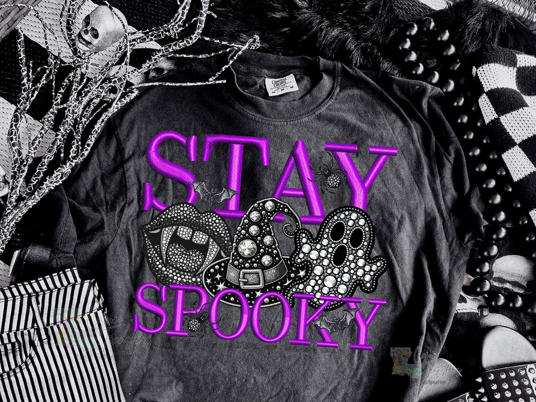 a shirt that says stay spooky on it
