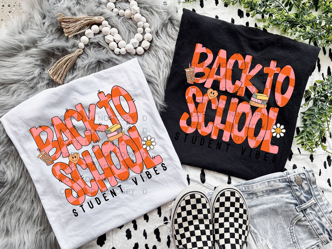 a pair of t - shirts that say back to school and back to school