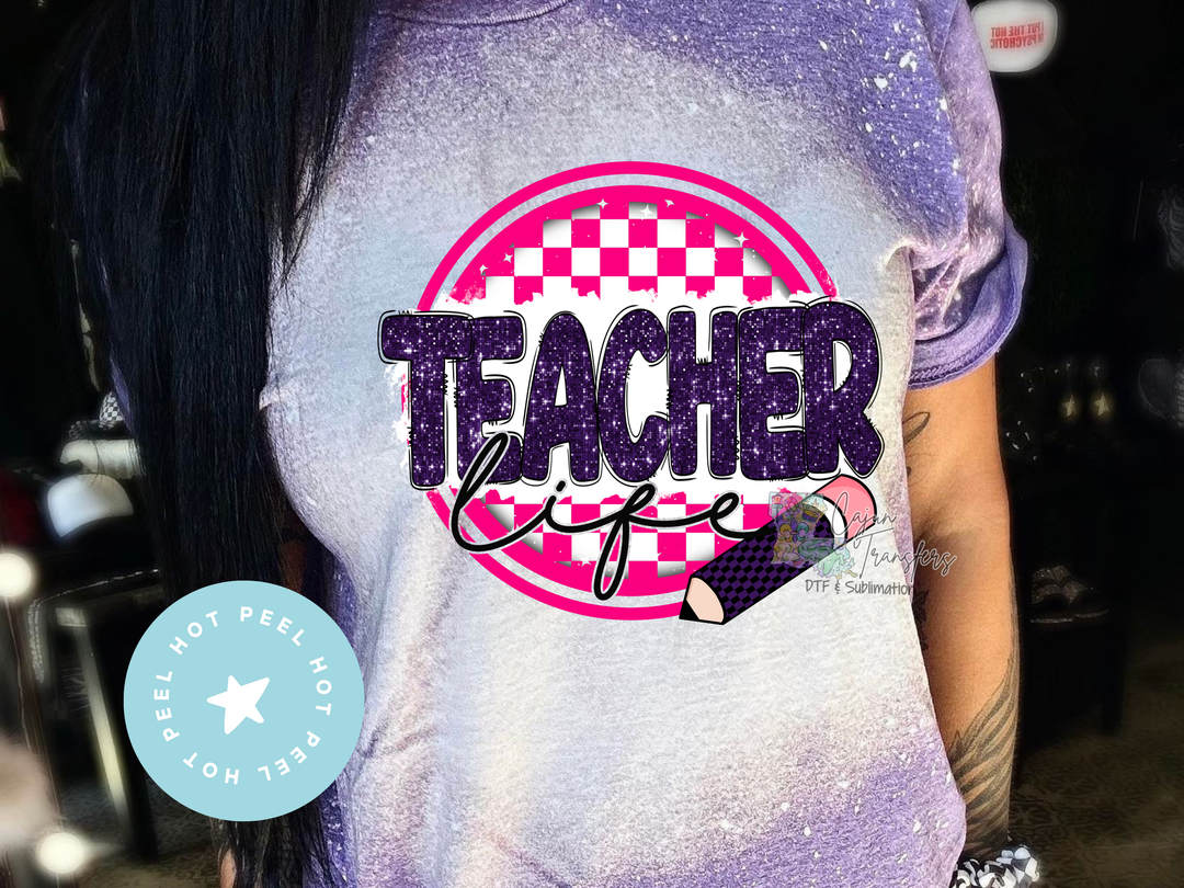 a woman wearing a t - shirt that says teacher life