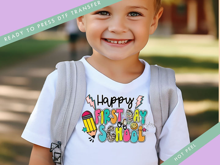 a young boy wearing a happy birthday shirt