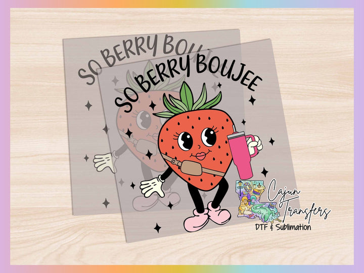 a picture of a strawberry holding a pink object