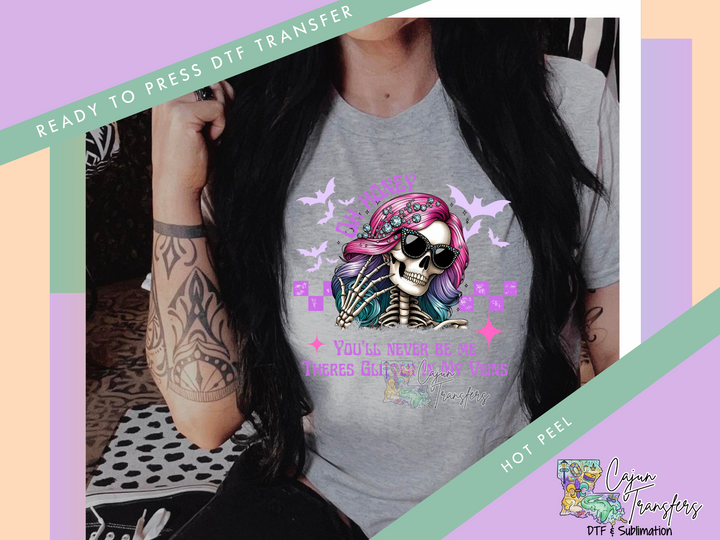 a woman with long hair wearing a t - shirt with a skull on it