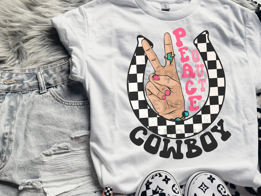 a pair of jeans and a t - shirt with a peace sign on it