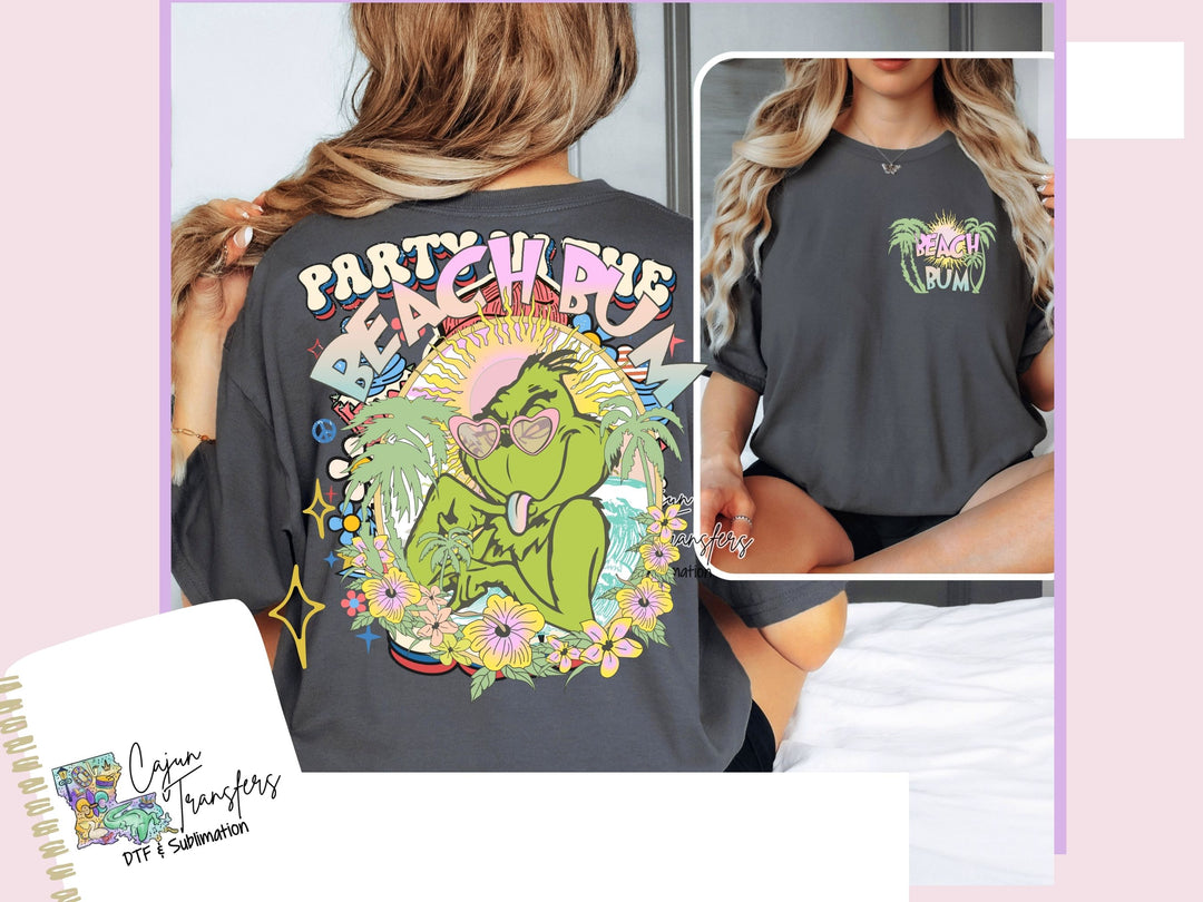 a woman wearing a black shirt with a picture of the grin on it