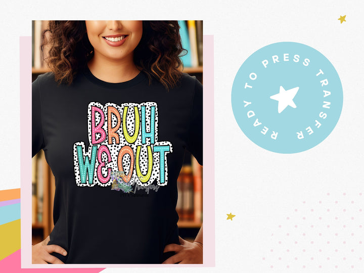 a woman wearing a black t - shirt with the words brau we out on