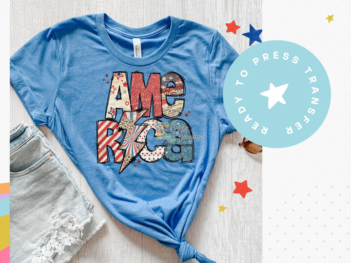 a blue t - shirt with the word america printed on it