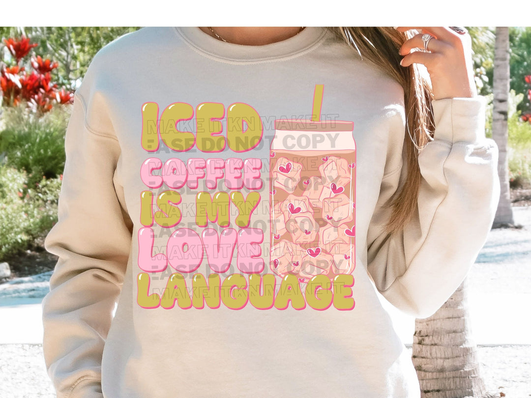 a woman wearing a sweatshirt that says coffee is my love language