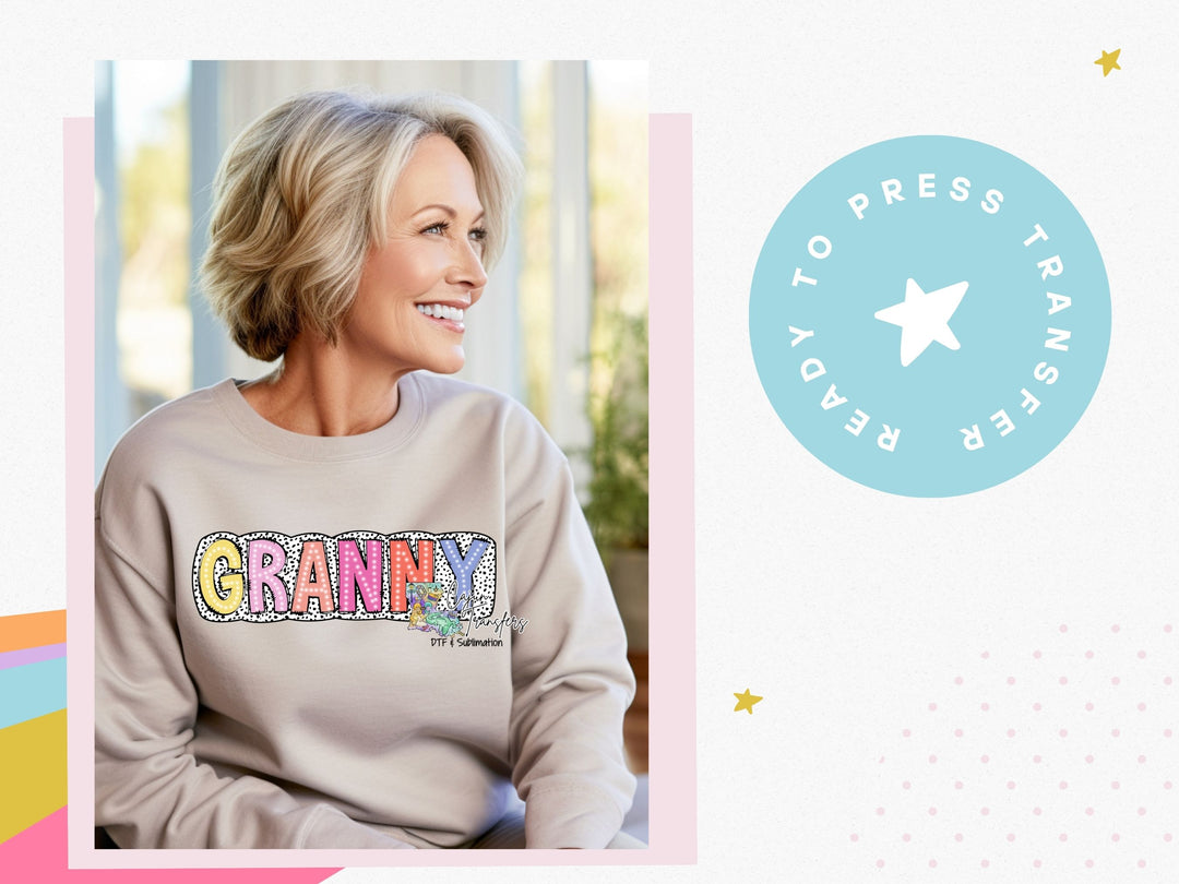 a woman with blonde hair wearing a gray granny shirt