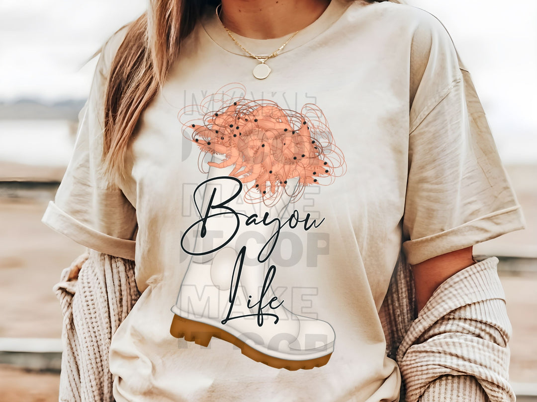 a woman wearing a t - shirt with a picture of a woman's head