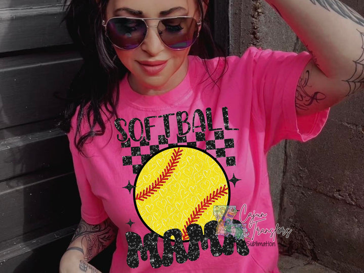 a woman wearing a softball shirt and sunglasses