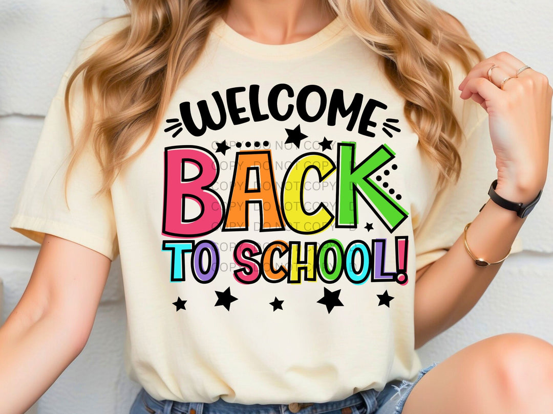 a woman wearing a t - shirt that says welcome back to school