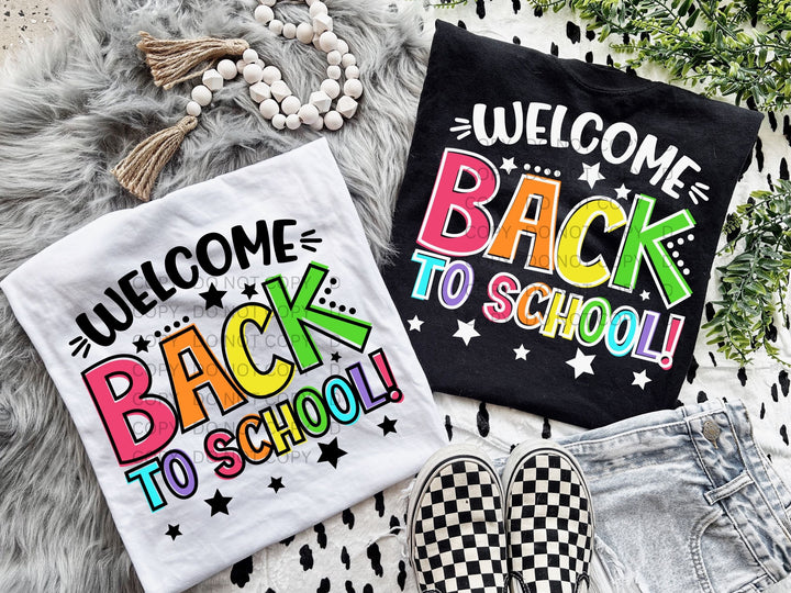 a pair of t - shirts that say welcome back to school and welcome back to