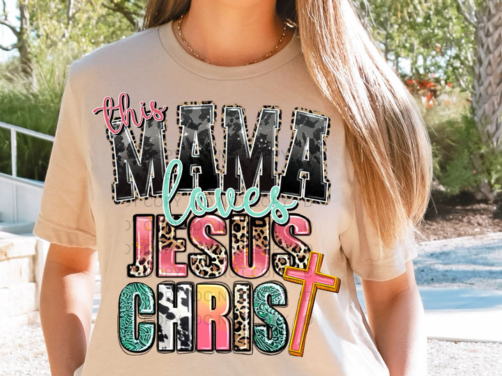 a woman wearing a t - shirt that says mama, jesus, and christ