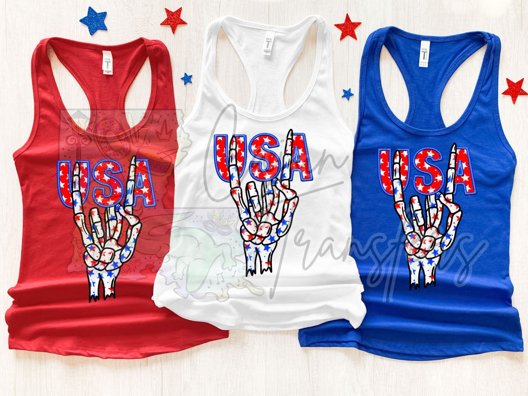 three women's tank tops with the words usa on them