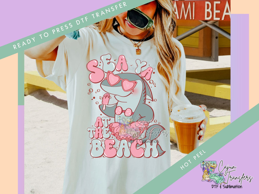 a woman wearing a white shirt and sunglasses