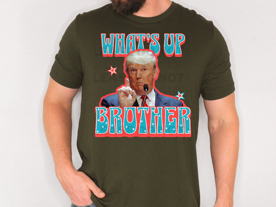 a man wearing a t - shirt that says, what's up brother?