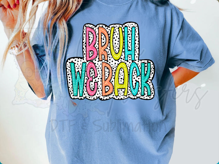a woman wearing a blue t - shirt with the words brou wabak