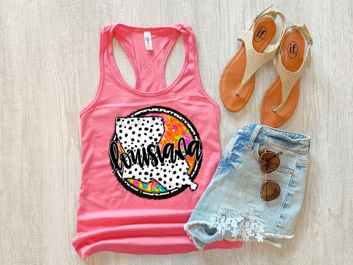 a pair of shorts and a pink tank top
