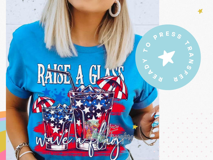 a woman wearing a blue shirt with a red white and blue design
