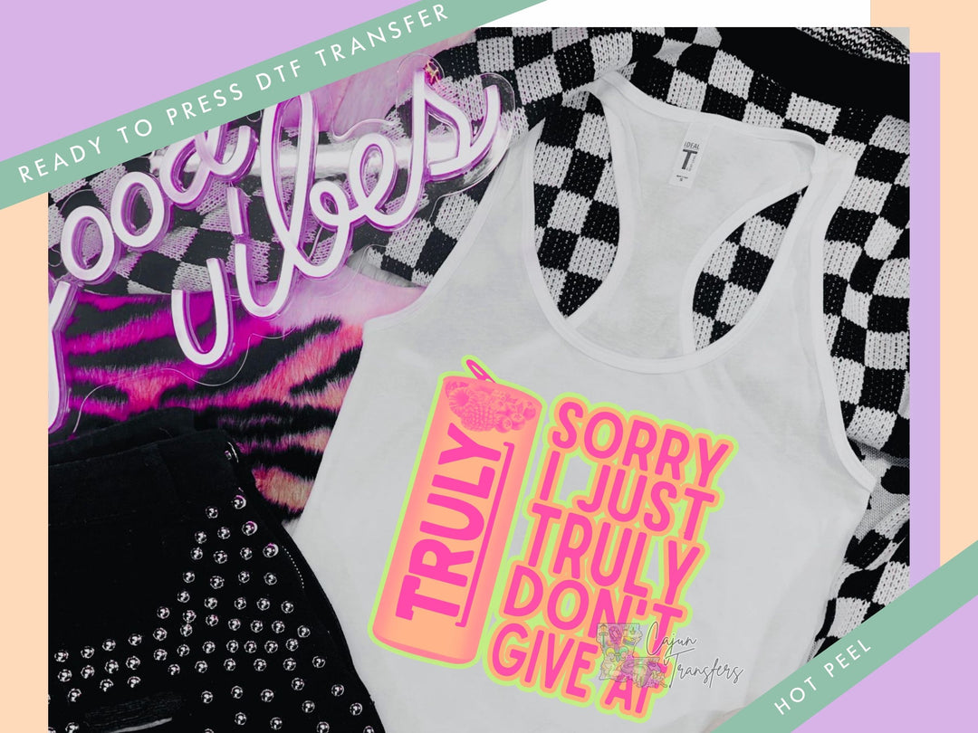 a white tank top that says sorry i just don't give up