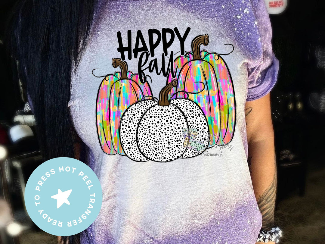 a woman wearing a purple happy fall shirt
