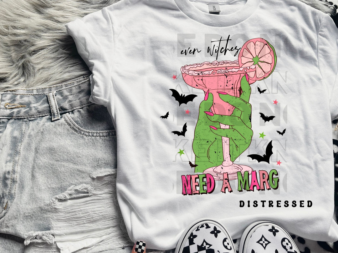 a white t - shirt with a pink drink on it