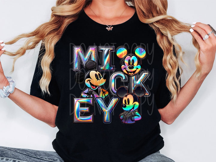 a woman wearing a black mickey mouse shirt