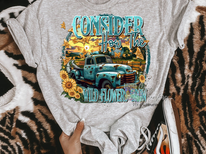a shirt with a truck and sunflowers on it