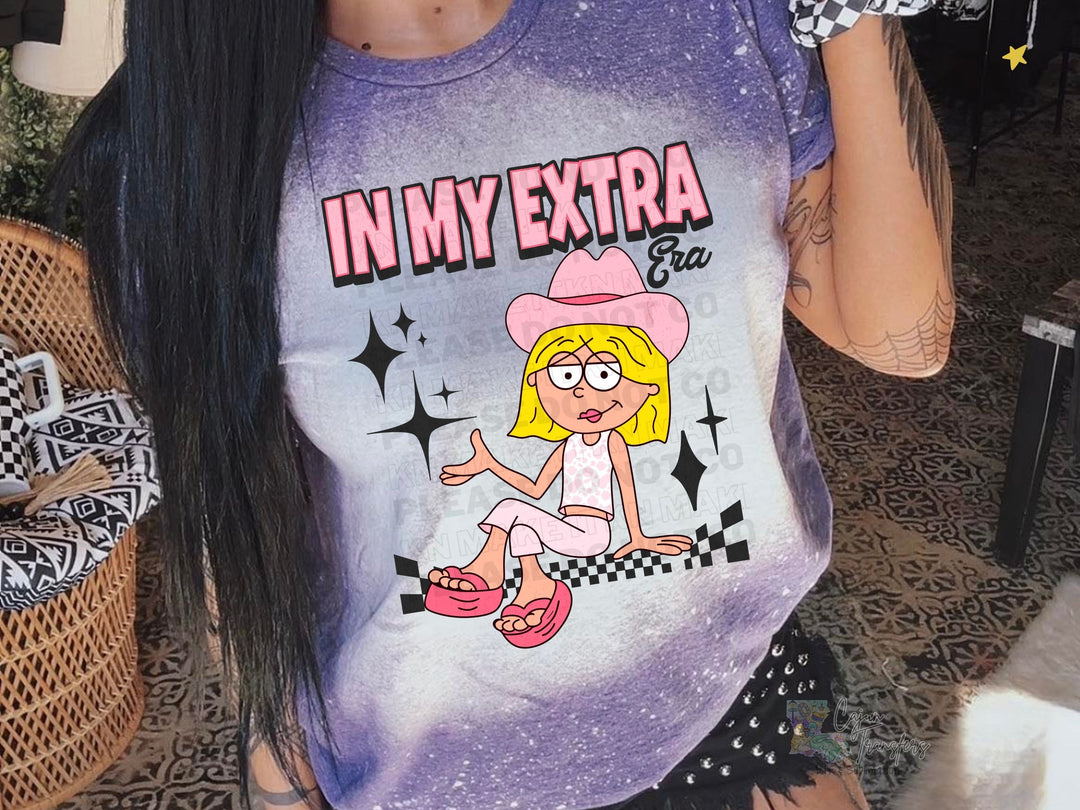 a woman with long black hair wearing a purple shirt