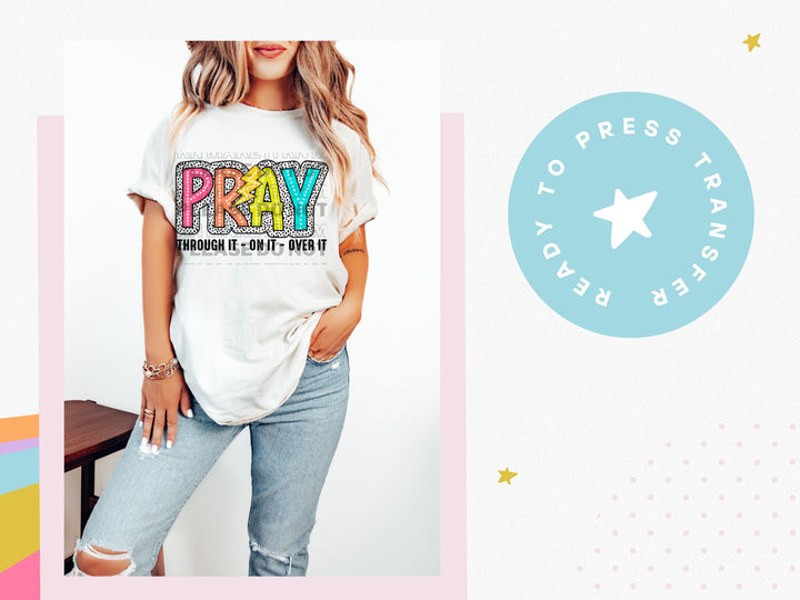 a woman wearing a white pray t - shirt