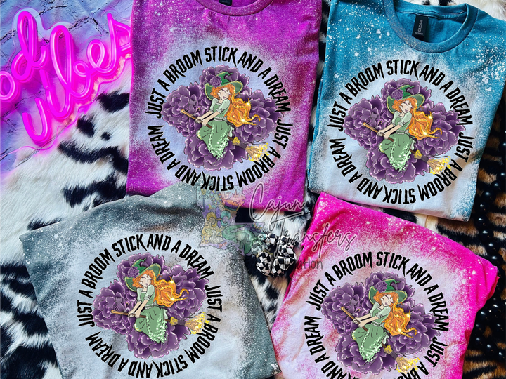 a group of three tshirts sitting on top of a bed