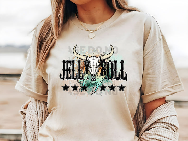 a woman wearing a white shirt with a bull skull on it