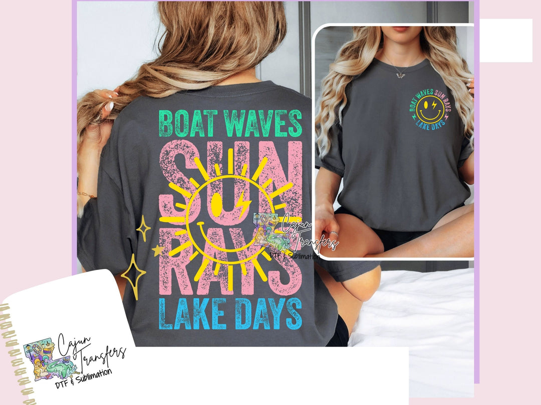 a woman wearing a boat waves sun rays lake days t - shirt